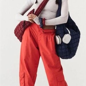 NWOT • Free People Movement Mesmerize Me Elastic Cargo Pant in Orange